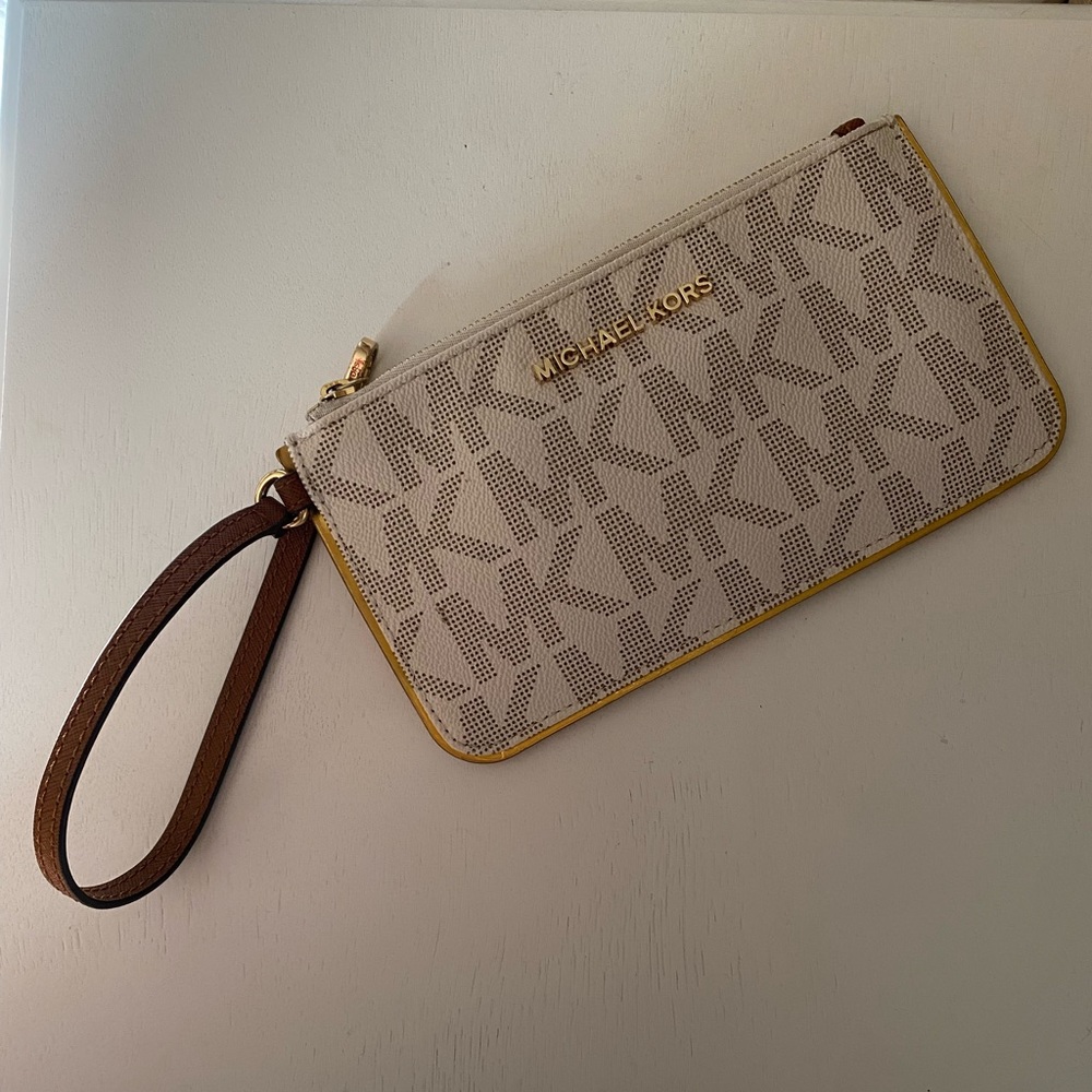Michael Kors white and gold wristlet